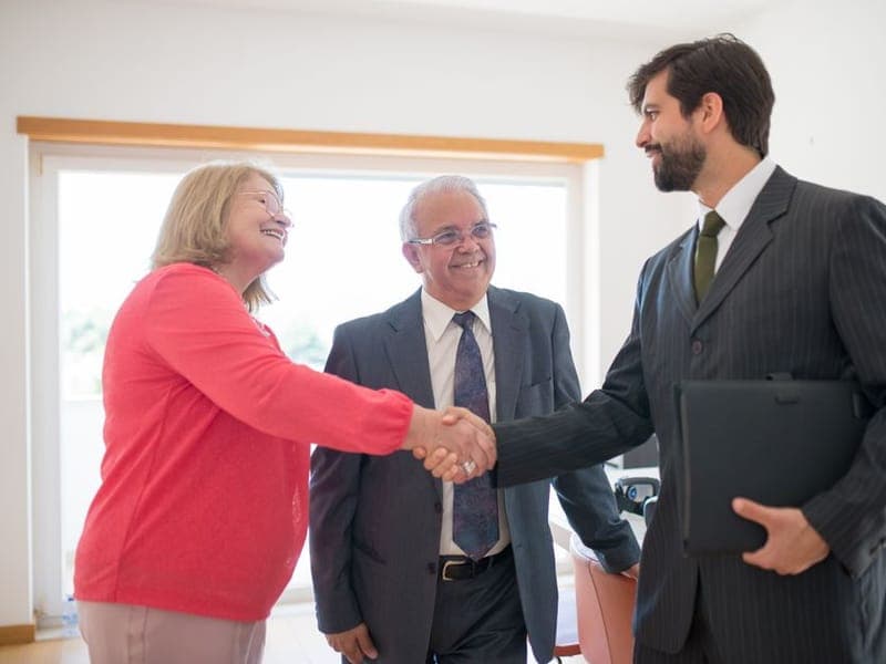 Business partners shaking hands